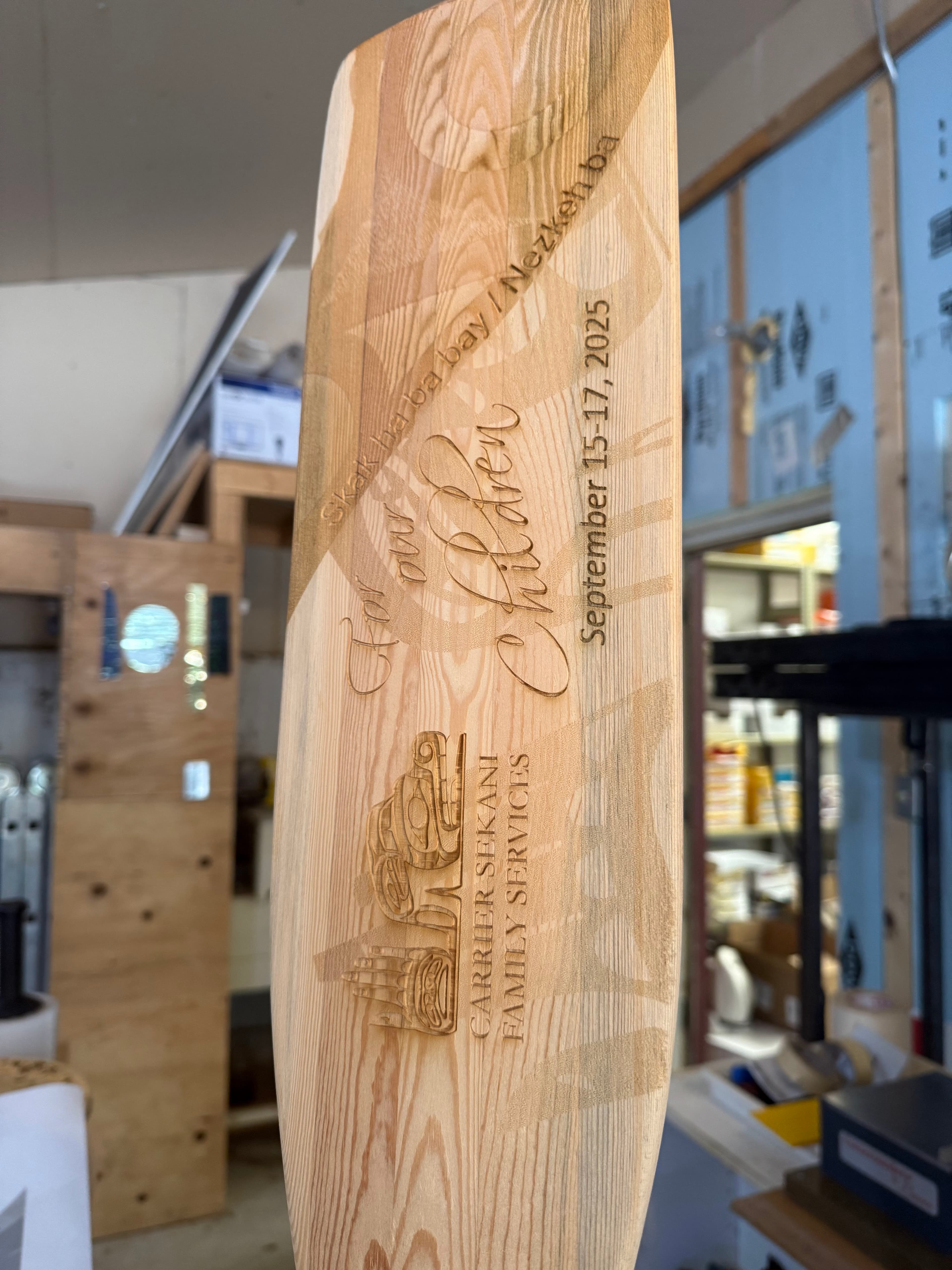 Workshop interior showing paddle crafting